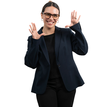 Confident businesswoman smiling and gesturing with her hands while wearing a professional blazer.