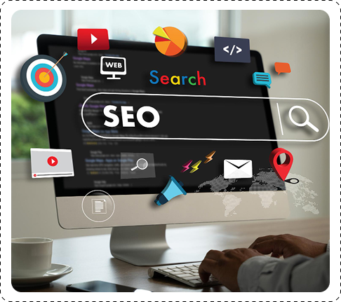 Web developer writing code on a desktop computer in a modern office workspace