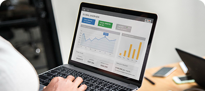 Website analytics dashboard displaying traffic, performance metrics, and growth data on a laptop screen.