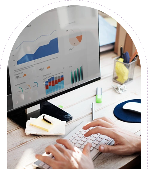 staff members working in revenue report graphs