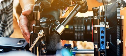 closeup of a camera being adjusted while filming